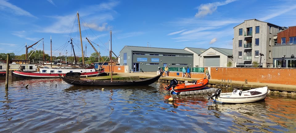 Woodbridge museum on river edge with boats